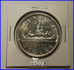 1947 Blunt 7 (Bl. Seven) Canada Silver Dollar Nicer Luster And Condition