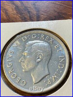 1947 Canada Silver Dollar Pointed 7 Choice Unc