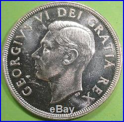 1948 CANADA $1 DOLLAR SILVER COIN BRILLIANT UNCIRCULATED KEY DATE 18,780 MINTED 1948 CANADA $1 DOLLAR SILVER COIN BRILLIANT UNCIRCULATED KEY DATE 18,780 MINTED