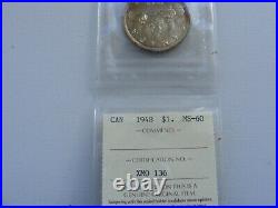 1948 Canada silver dollar ICCS MS 60. Under-graded