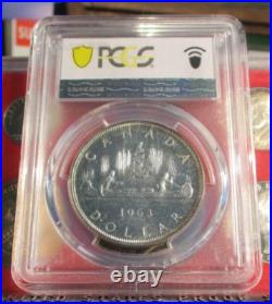 1963 Canada Silver Dollar, PCGS Proof Like MS 66 Trueview- Rainbow Toned 1963 Canada Silver Dollar, PCGS Proof Like MS 66 Trueview- Rainbow Toned