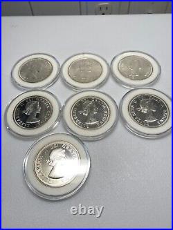 1964 canadian silver dollars Centennial Uncirculated Encapsulated lot of 7