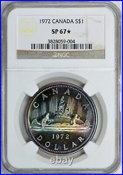 1972 Canada Silver Dollar NGC SP67 Star Monster Rainbow Toned Voyager Canoe