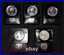 5 Pcs, Canada Silver $1 Coins. 4 Commemorative & 1 Rcmp, In Leather Cases