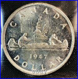 Canada 1947 Blunt 7 $1 Key Date Silver Dollar Graded ICCS MS62. J15