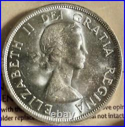 Canada 1957 $1 Voyageur Silver Dollar Graded ICCS MS64. Cert# XBN411