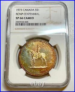 Canada 1973 R. C. M. P. Centennial Silver Dollar Coin Toned NGC SP66 CAMEO
