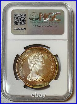 Canada 1973 R. C. M. P. Centennial Silver Dollar Coin Toned NGC SP66 CAMEO