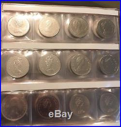 Collection of 31 Canadian Silver and Nickel Dollars Album. Mint State