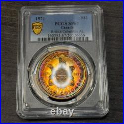 SP67 1971 $1 Canada Silver BC Commem Dollar, PCGS Trueview- Rainbow Toned SP67 1971 $1 Canada Silver BC Commem Dollar, PCGS Trueview- Rainbow Toned