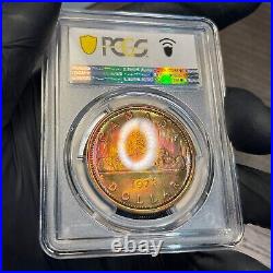 SP67 1972 Canada Voyageur Silver Dollar, PCGS Trueview- Deep Rainbow Toned