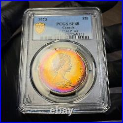 SP68 1973 $1 Canada RCMP Silver Dollar, PCGS Trueview- Pretty Rainbow Toned