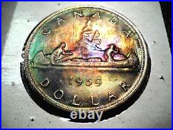 WOW. Something COMPLETELY Different! 1959 Canada Voyageur Silver Dollar